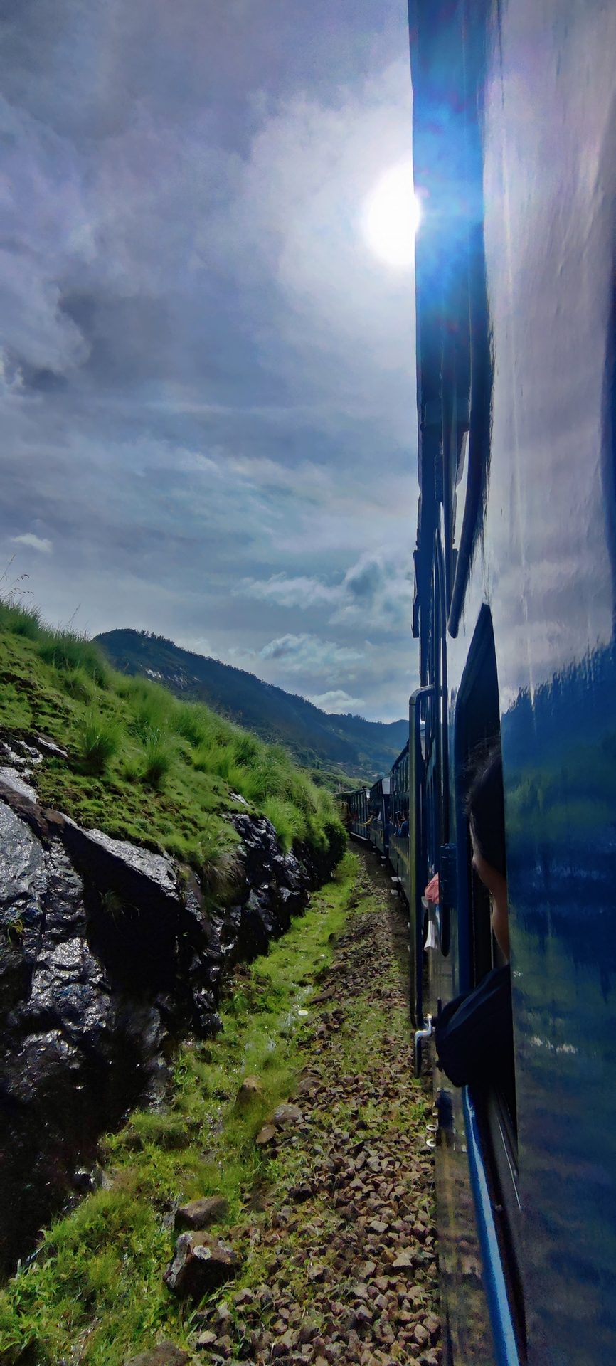 Rolling stock, Sky, Plant, Cloud, Mountain, Highland, Train