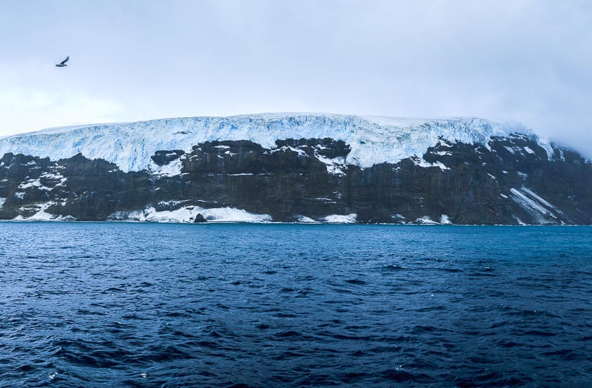 Polar ice cap, Natural landscape, Water, Cloud, Sky, Mountain, Bird, Snow, Highland, Lake