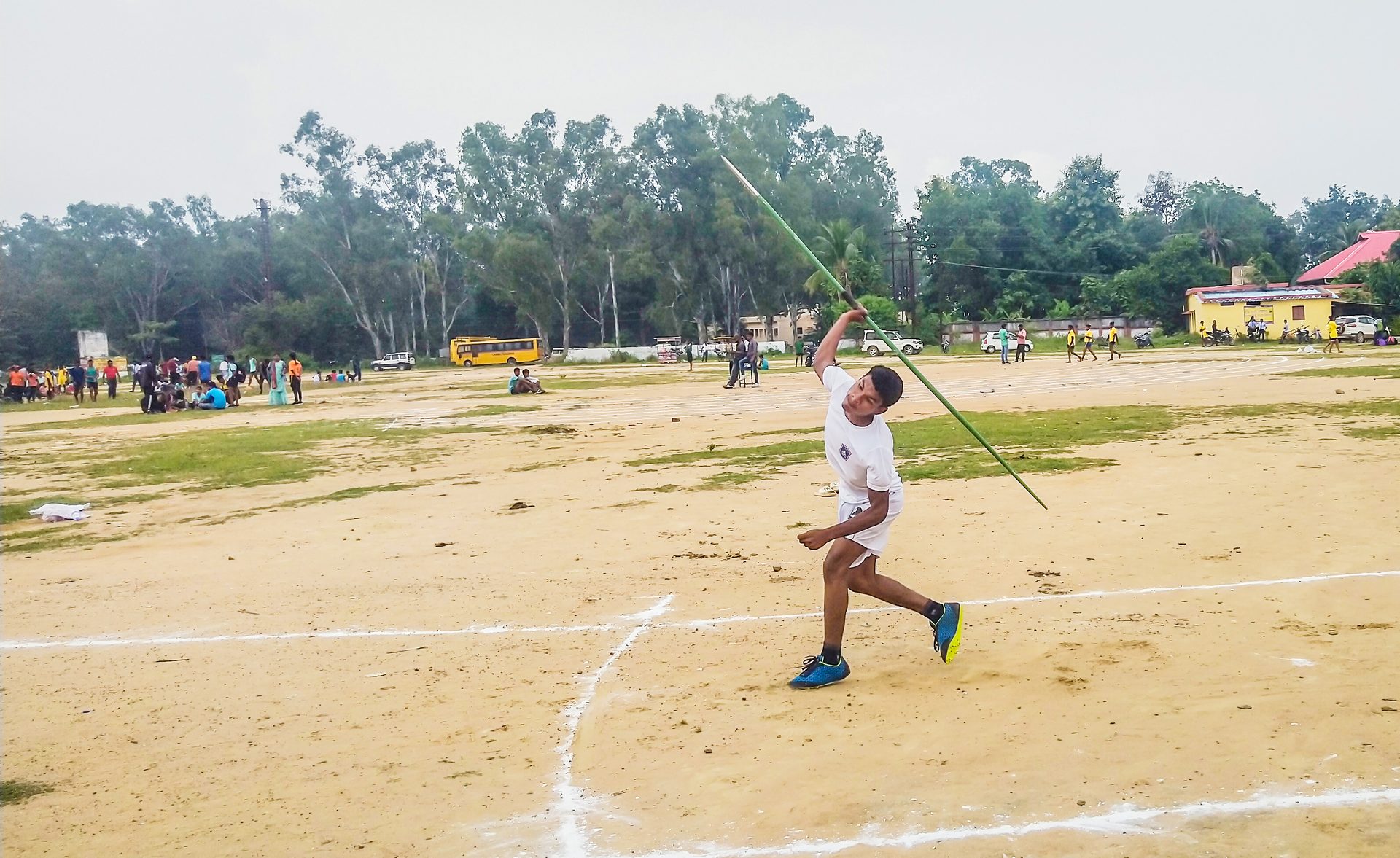 Active shorts, Sports equipment, Sky, Tree, Player