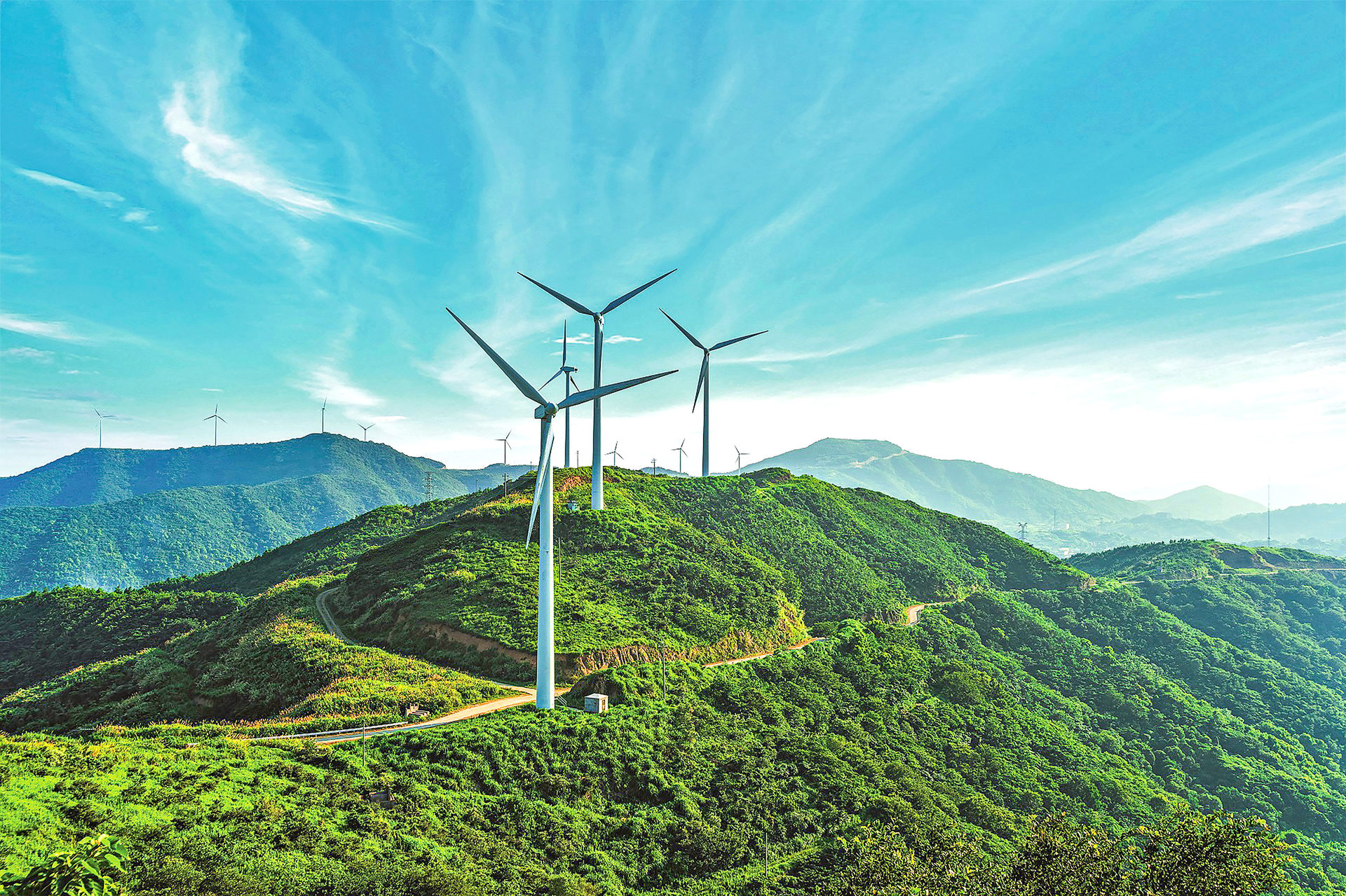 Wind farm, Natural landscape, Land lot, Cloud, Sky, Mountain, Slope, Highland, Electricity