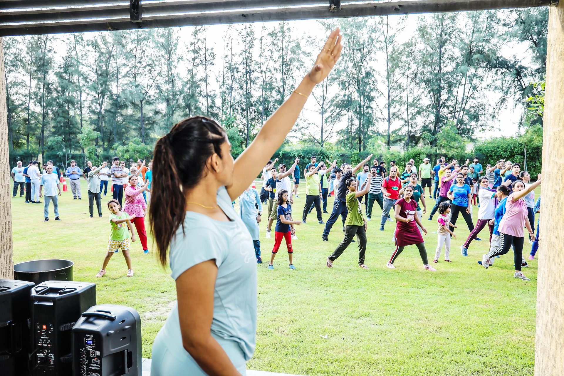 Outdoor recreation, Competition event, Plant, Shorts, Vertebrate, Tree, Mammal, Gesture, Grass, Leisure