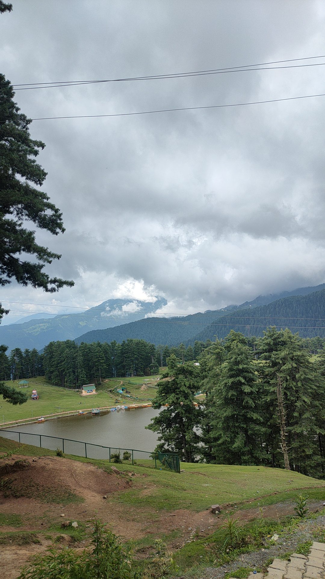 Natural landscape, Atmospheric phenomenon, Cloud, Sky, Plant, Water, Mountain, Nature, Tree, Highland