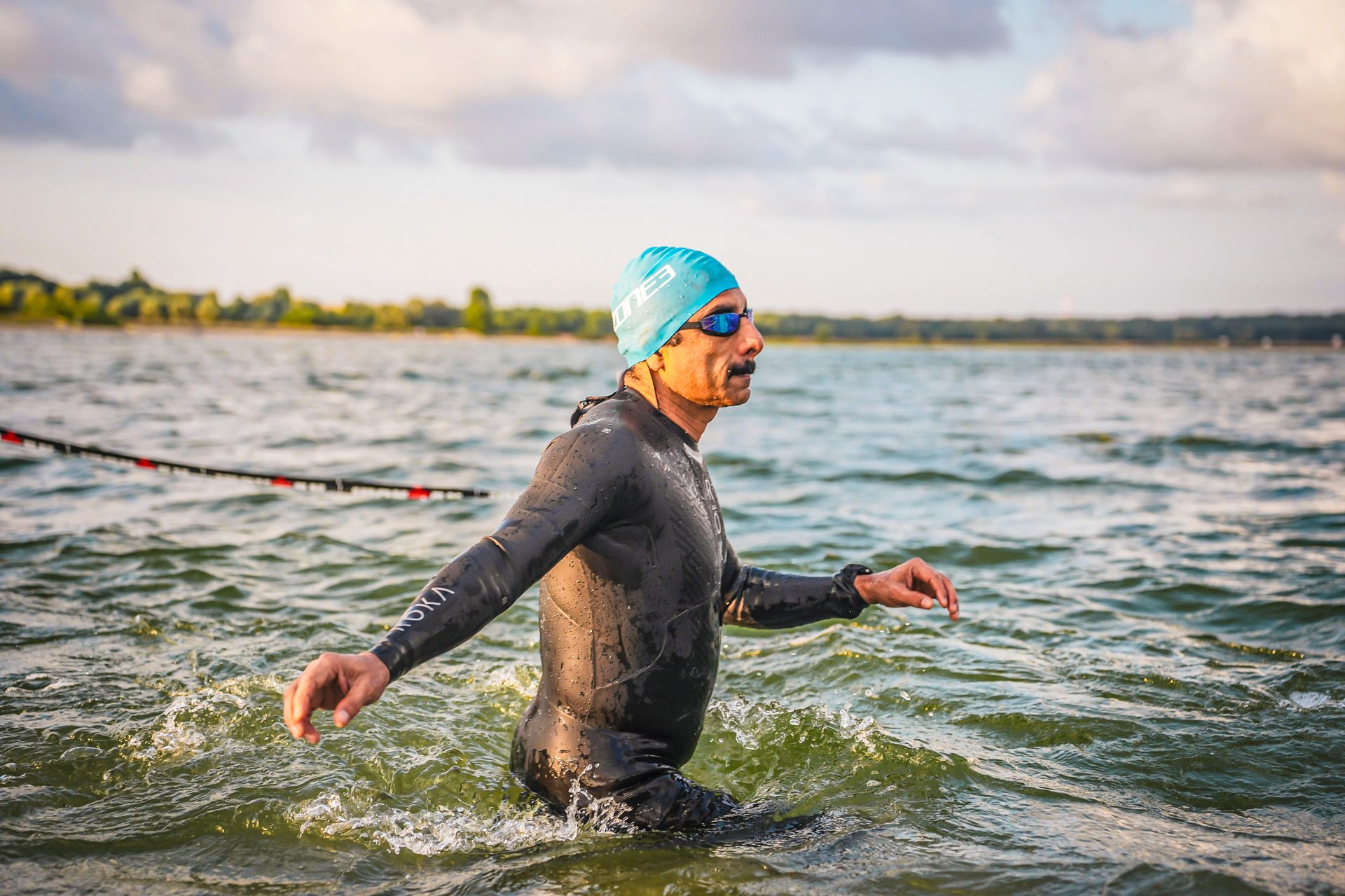 Outdoor recreation, Swim cap, Water, Sky, Cloud, Lake, Happy, Quadrathlon