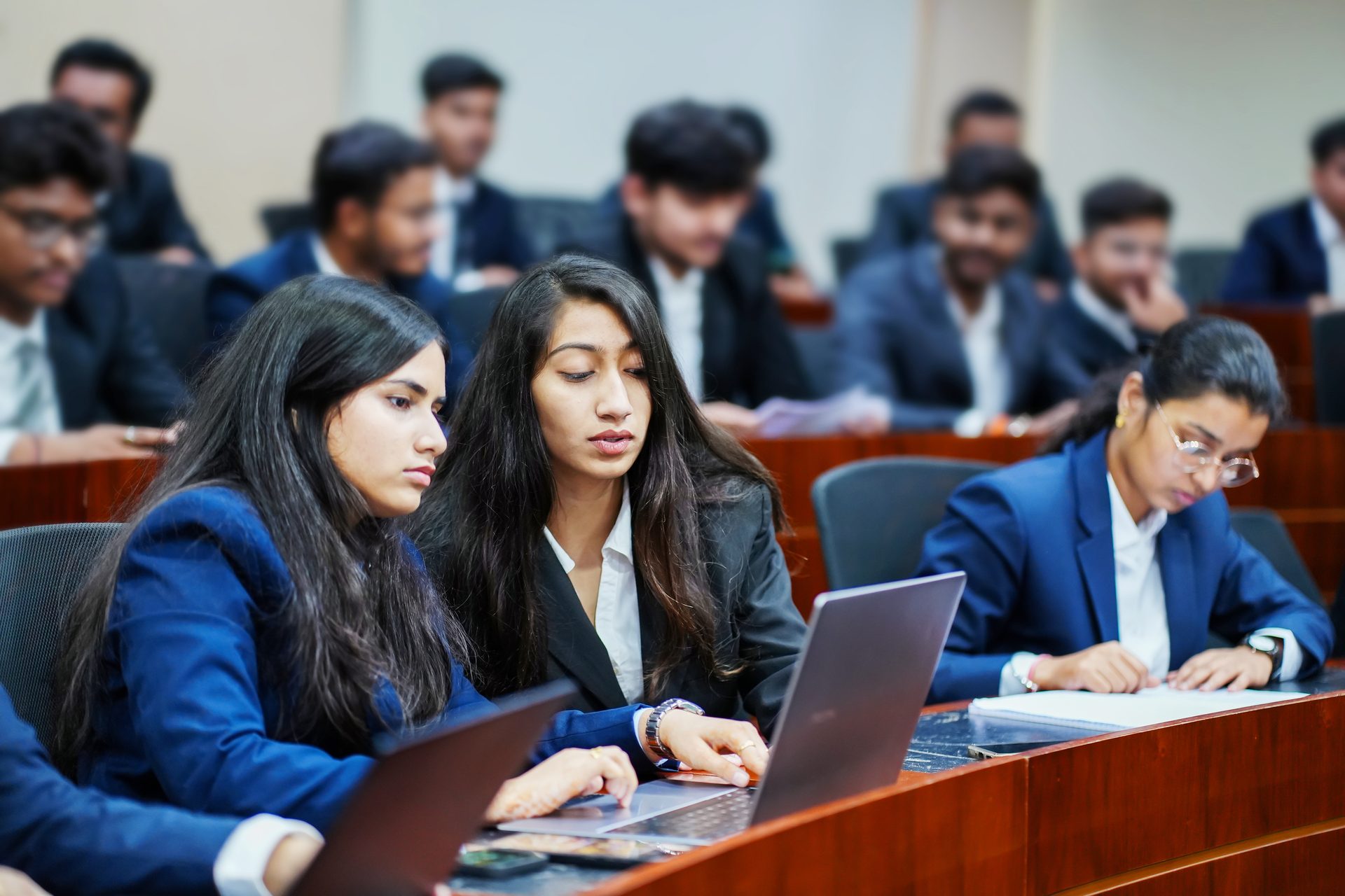 Social group, People, Clothing, Furniture, Outerwear, Interaction, Chair, Audience, Coat, Meeting